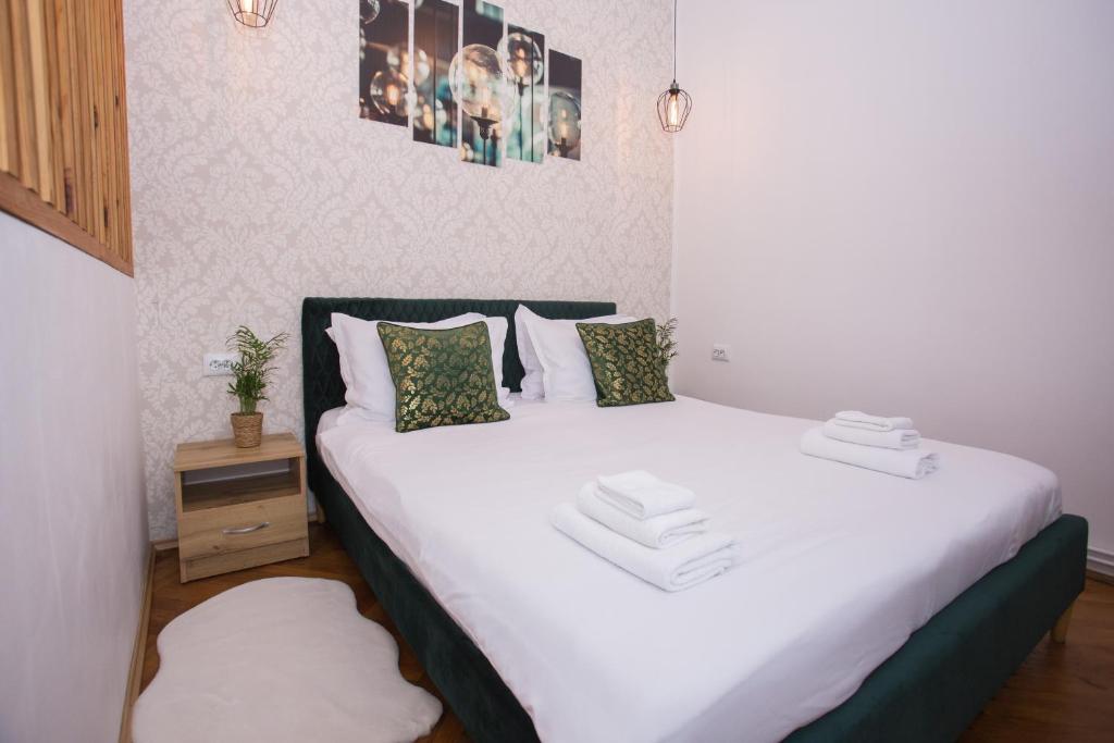 Ένα ή περισσότερα κρεβάτια σε δωμάτιο στο Joseph Hayn Apartments