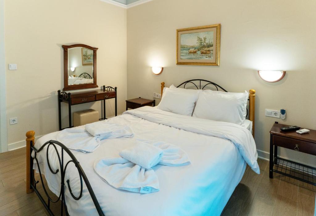 Ένα ή περισσότερα κρεβάτια σε δωμάτιο στο vintege style apartment