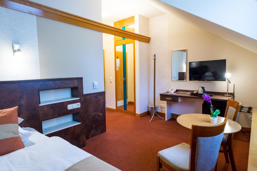 Telewizja i/lub zestaw kina domowego w obiekcie Hotel Spa Hévíz