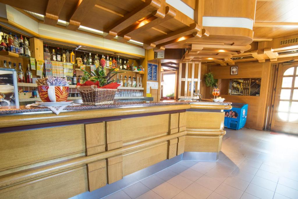 Kuchyň nebo kuchyňský kout v ubytování Hotel Pavone