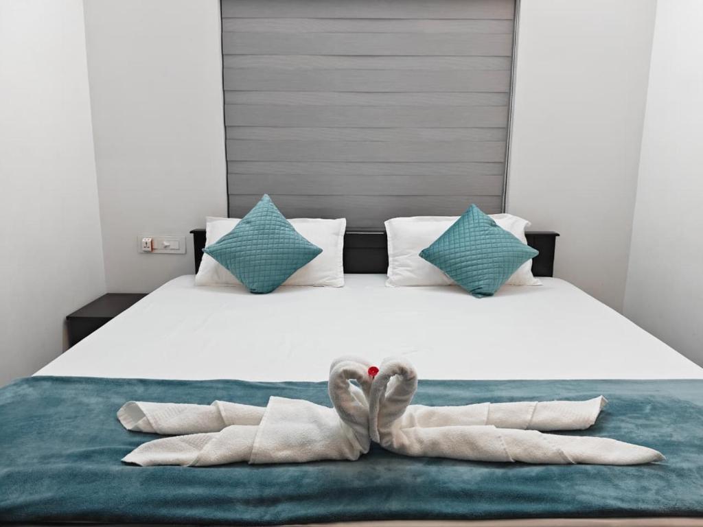Katil atau katil-katil dalam bilik di Whitefort Family Villa Alleppy-Homestay