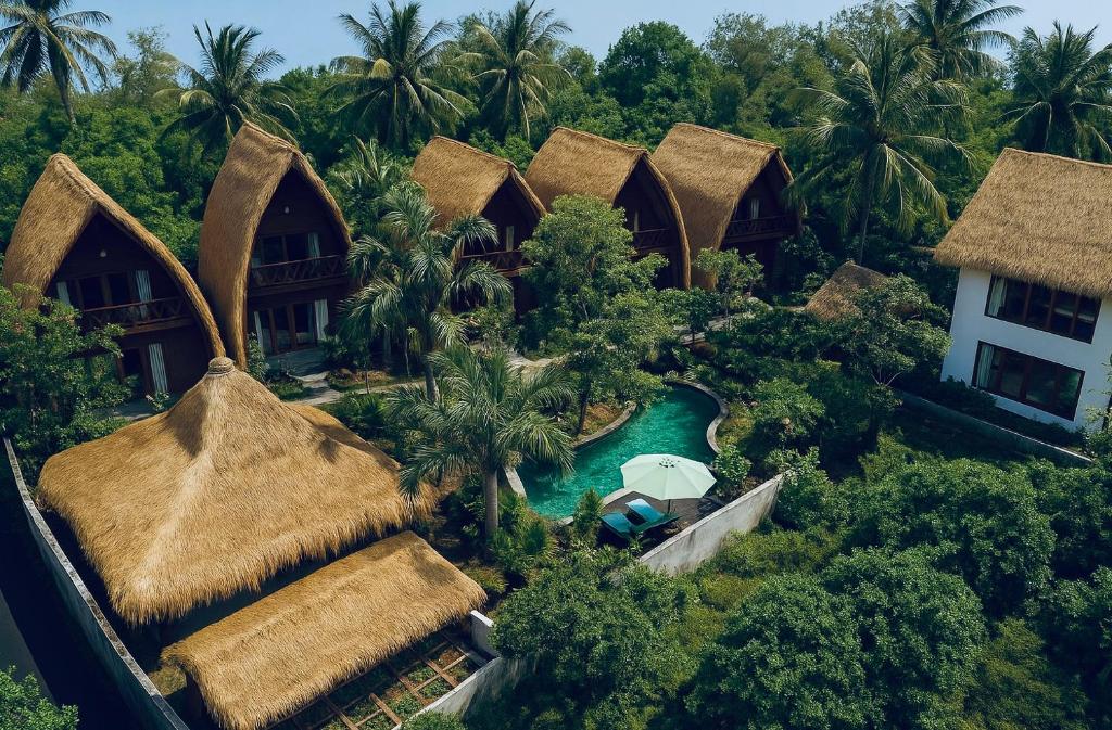 an aerial view of a resort with a swimming pool at Corabelle Gili Air in Gili Air