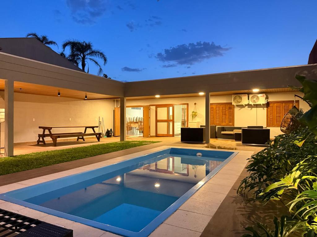 Πισίνα στο ή κοντά στο Xangri-Lá - Casa com piscina