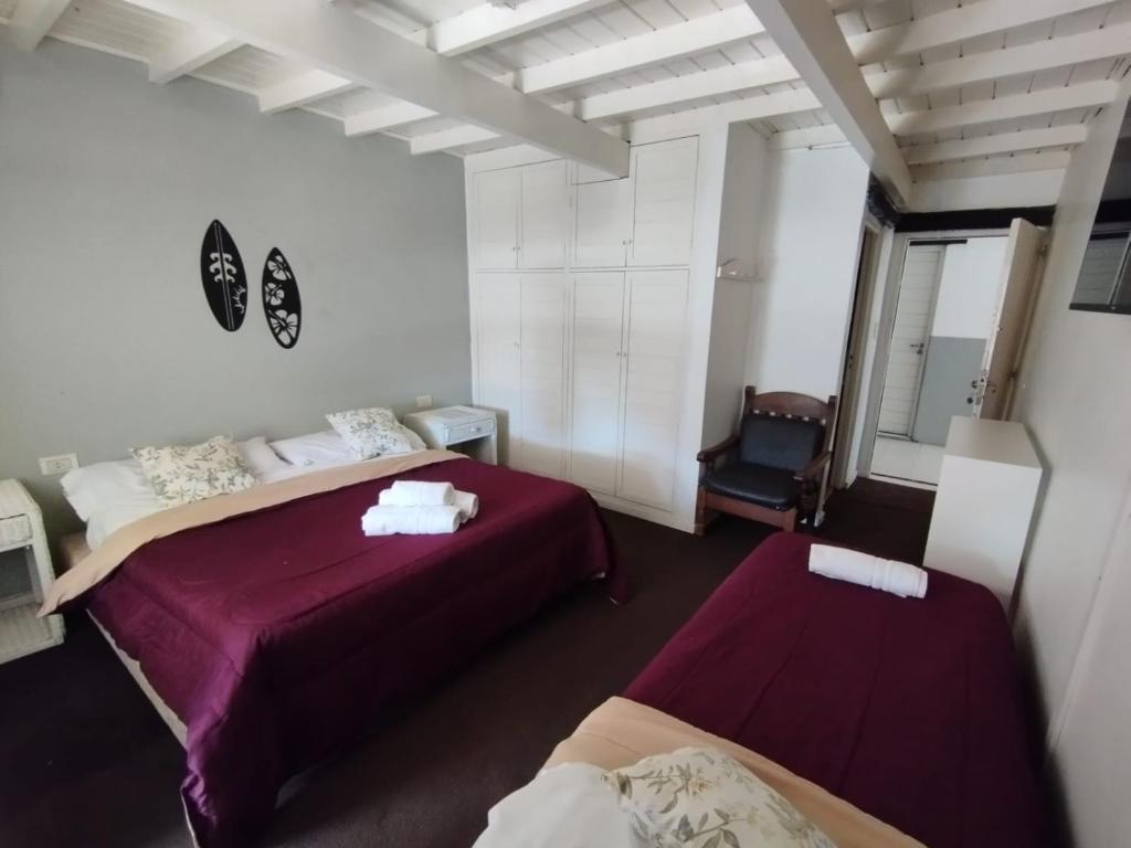 Ένα ή περισσότερα κρεβάτια σε δωμάτιο στο Espacio Arena