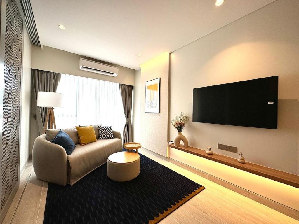 Μια τηλεόραση ή/και κέντρο ψυχαγωγίας στο New apartments in a premium Laguna complex by the lake