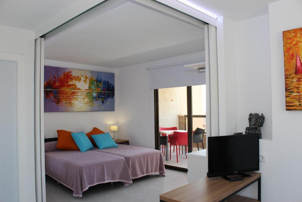 Posteľ alebo postele v izbe v ubytovaní Apartamentos Vistamar