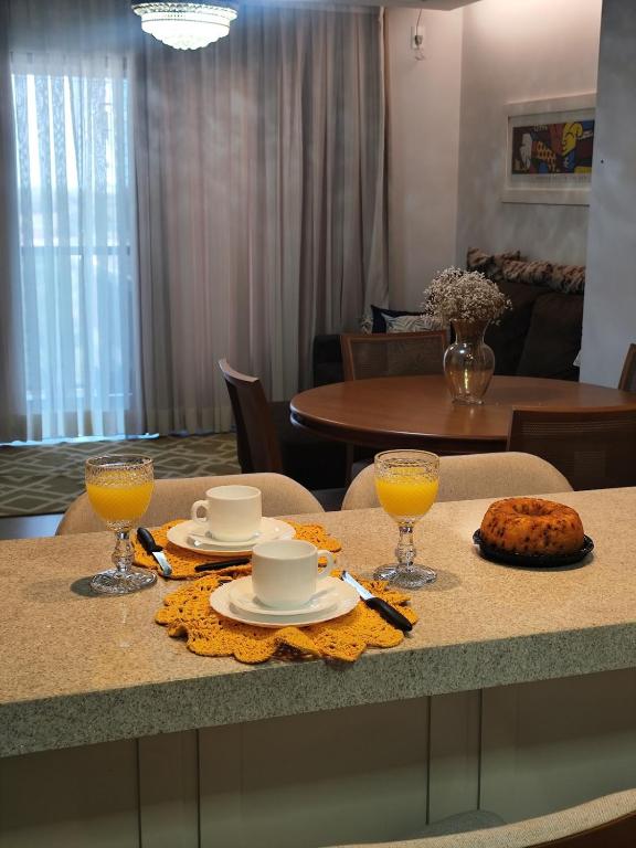 Nápoje v ubytování AP central Pôr do sol 2 quartos