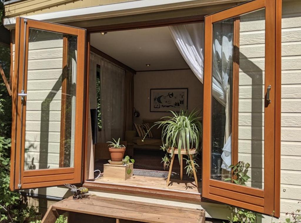 Κήπος έξω από το Chaletpark Kempenbos - 73