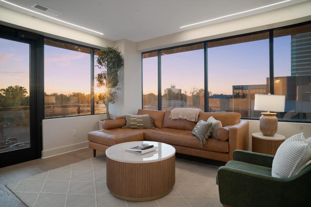 a living room with a couch and a table at Thoroughbred Retreat Unit 803 in Lexington
