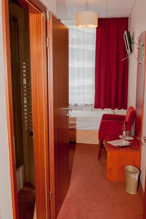 Postel nebo postele na pokoji v ubytování Hotel Residence am Hauptbahnhof