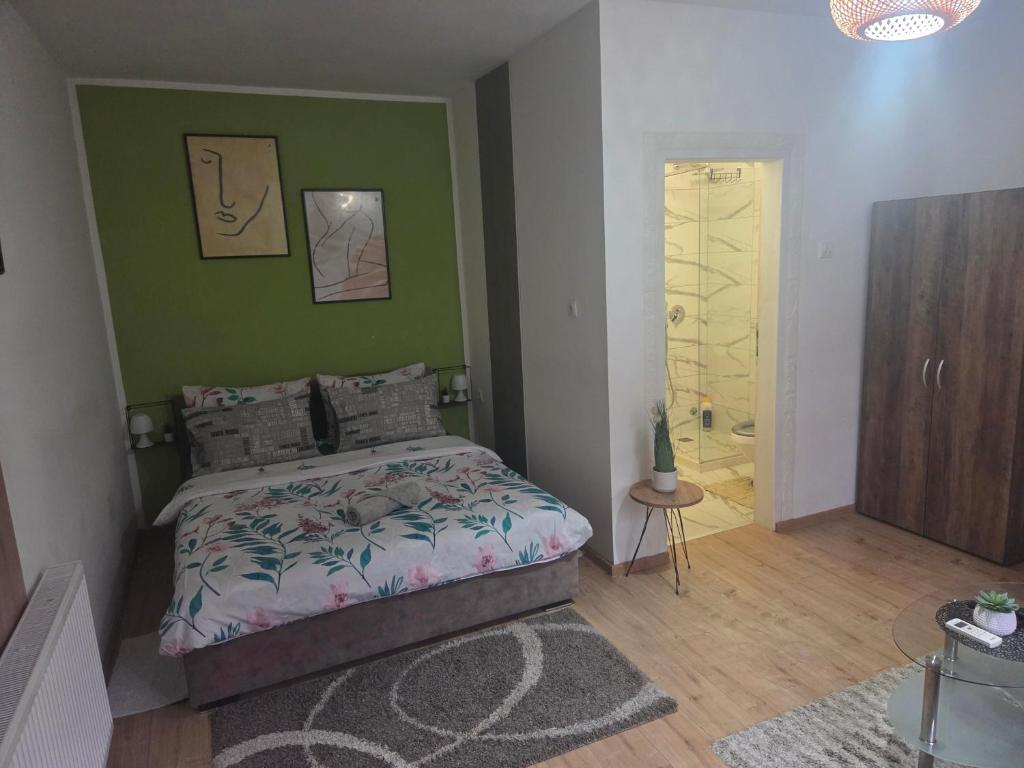 Postel nebo postele na pokoji v ubytování Zen apartman 8