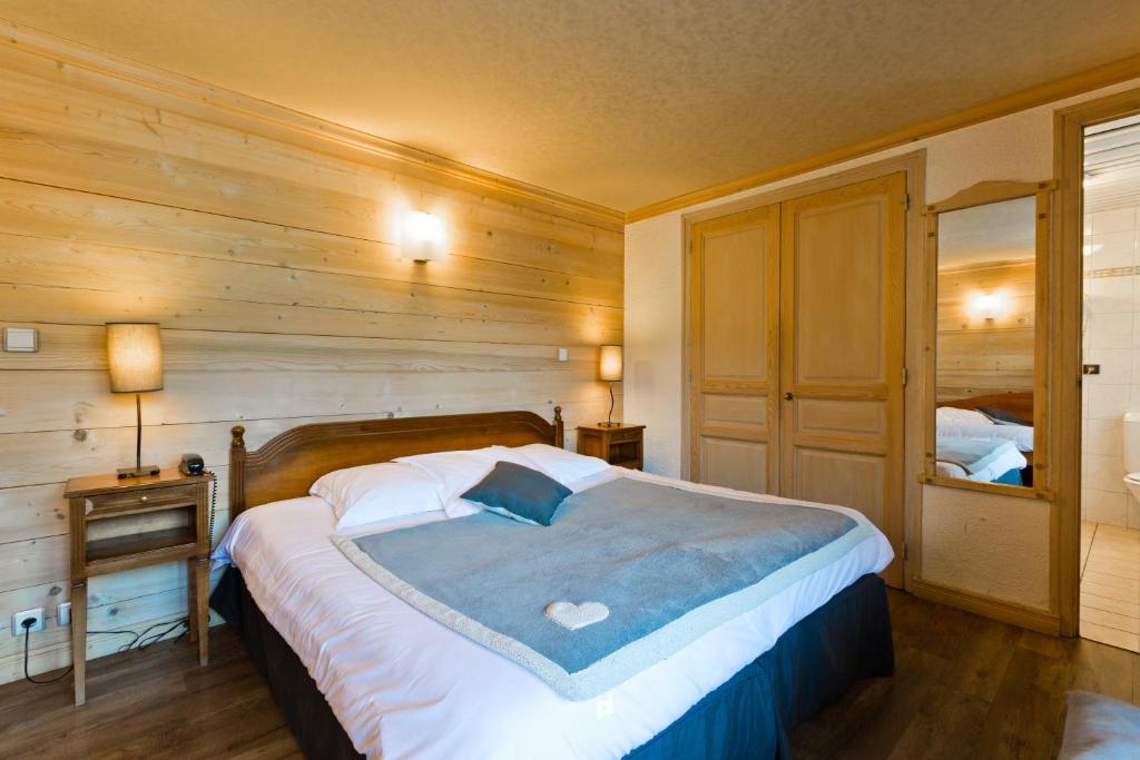 Postel nebo postele na pokoji v ubytování Hôtel La Montagne