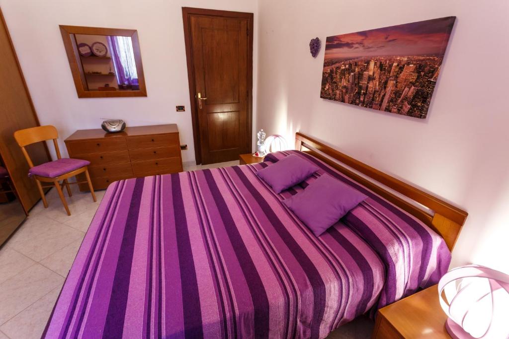 Postel nebo postele na pokoji v ubytování L'Aurora Viola