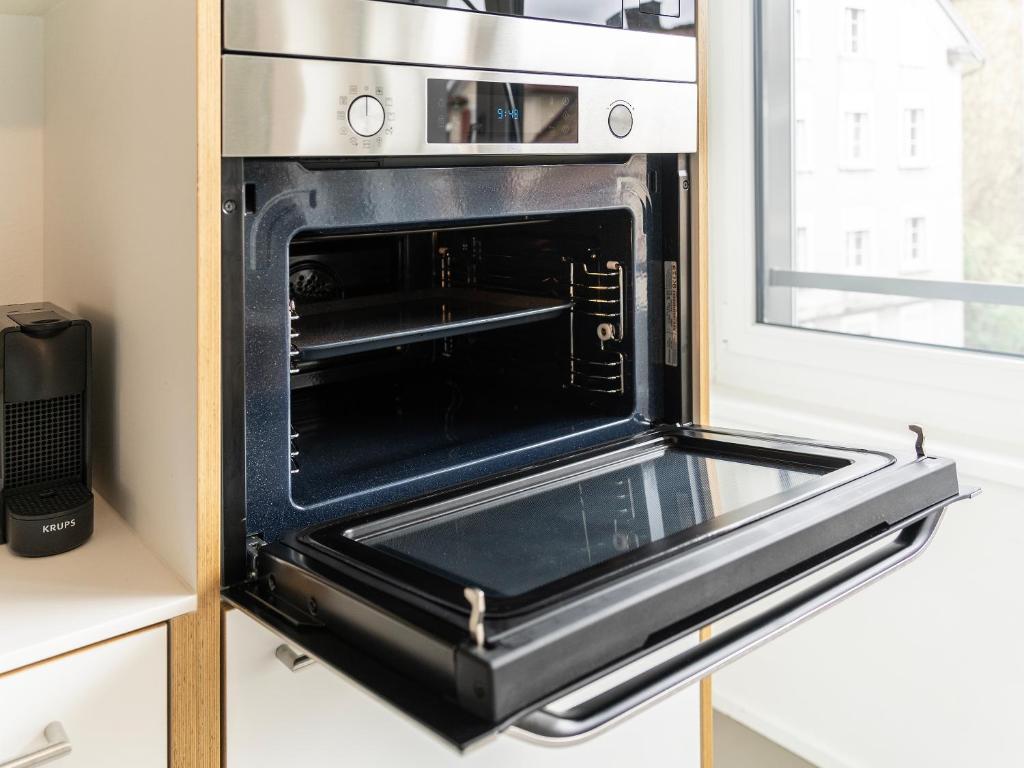 Modernes Hostel, Privatzimmer in Shared Apartment, 6min zur Olma Messe - Resim 26