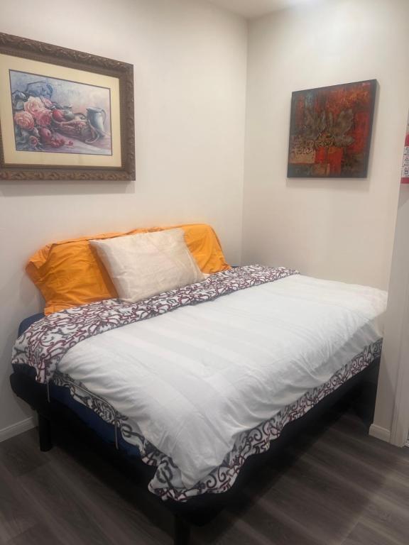 En eller flere senge i et værelse på Tiny lovely Studio