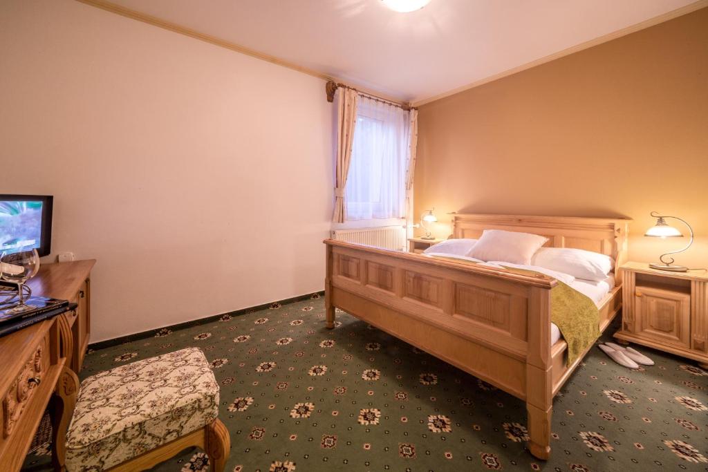 Postel nebo postele na pokoji v ubytování Hotel Diana