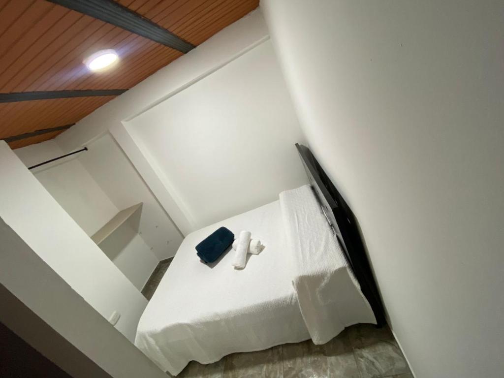 Ένα ή περισσότερα κρεβάτια σε δωμάτιο στο Casa la esquina