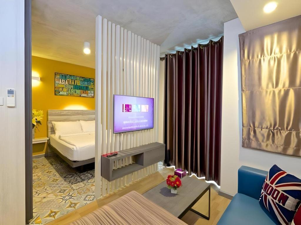 Ένα ή περισσότερα κρεβάτια σε δωμάτιο στο BB House Mini Suite Hotel