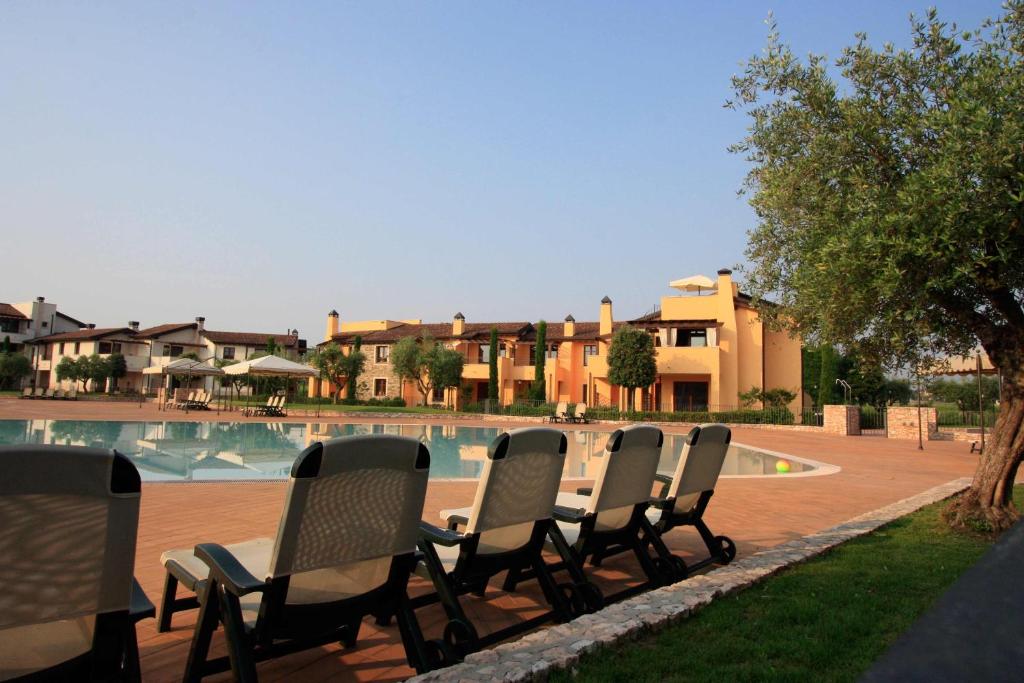 The swimming pool at or close to Lugana Resort & Sporting Club