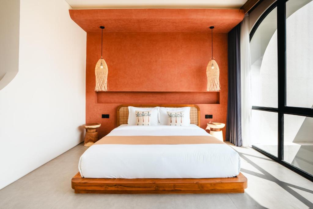 Postel nebo postele na pokoji v ubytování Novo Villa Canggu