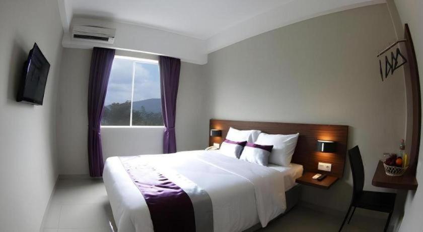 Кровать или кровати в номере Amantis Hotel