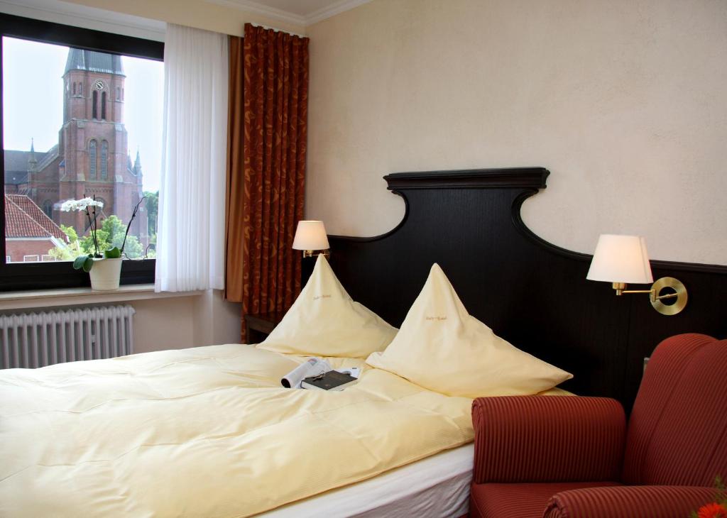 Postel nebo postele na pokoji v ubytování Altes Gasthaus Kuhr - Hotel & Restaurant