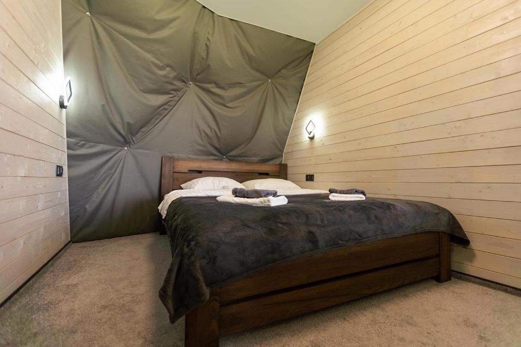 Postel nebo postele na pokoji v ubytování DoReMi Space