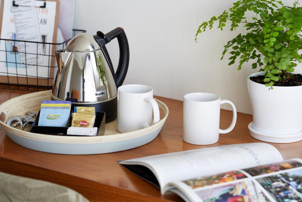 Cosmopolitan Hotel and Apartments - Resim 21