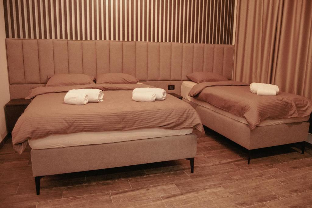 Postel nebo postele na pokoji v ubytování Apartmani TAL-AS