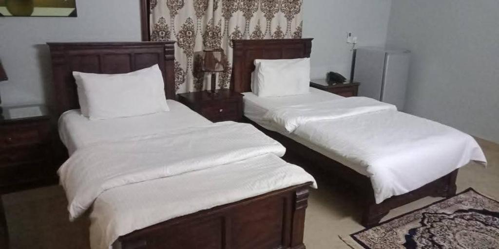 Ένα ή περισσότερα κρεβάτια σε δωμάτιο στο Seaview Classic Hotel