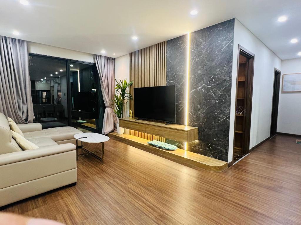 TV a/nebo společenská místnost v ubytování Ha Đo Centrosa Building , Ba Thang Hai street, distrist 10