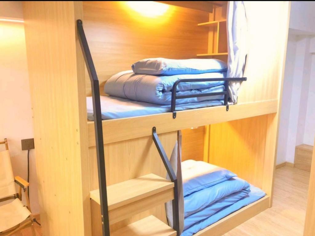 Ένα ή περισσότερα κρεβάτια σε δωμάτιο στο Happy Hours