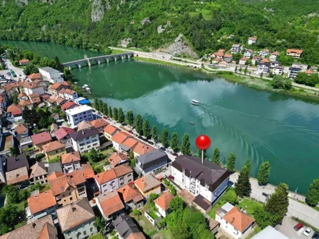 an aerial view of a small town on the river at Apartment Aluna 3 in Višegrad