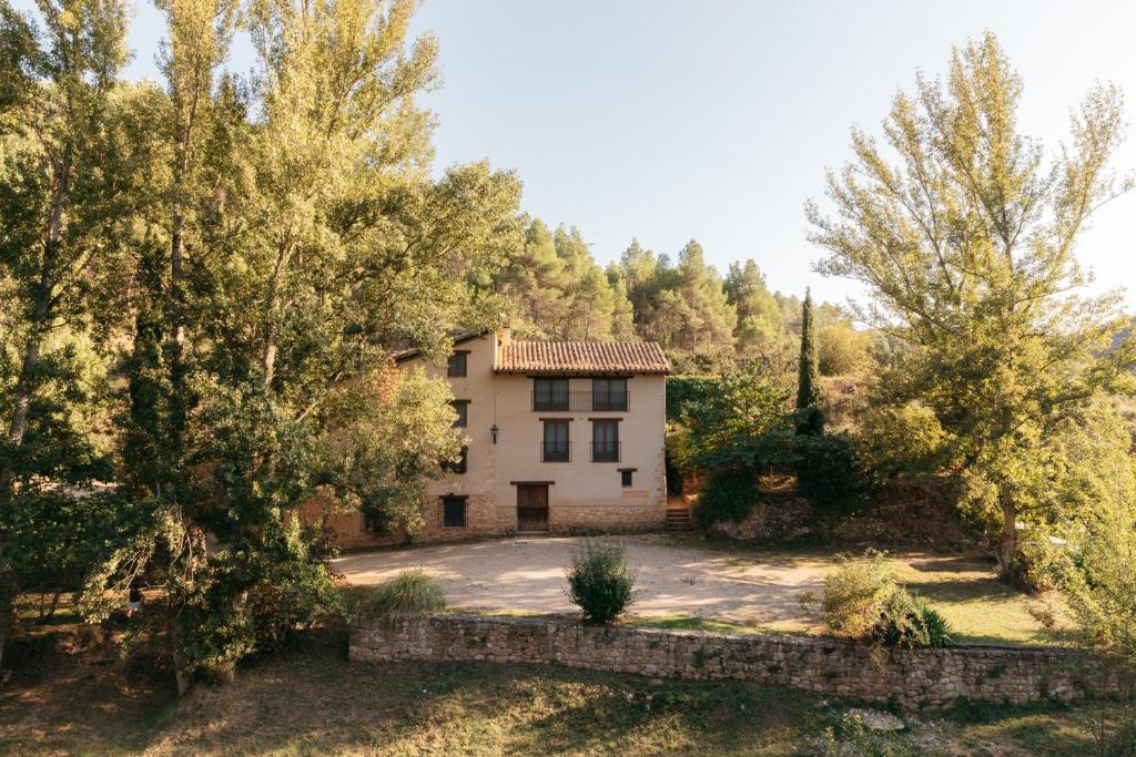 an aerial view of a house with trees at El Molí Nou - Rural flats in Peñarroya de Tastavins