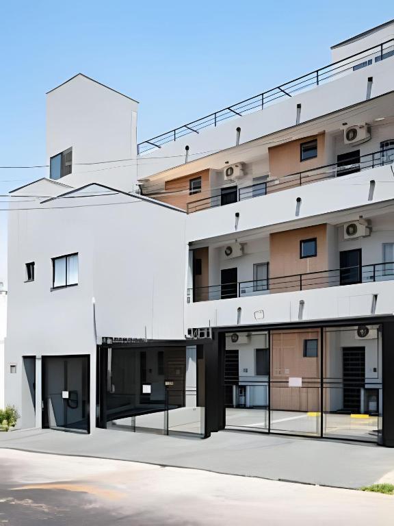 a rendering of the front of a building at Xavi Studio in Bauru