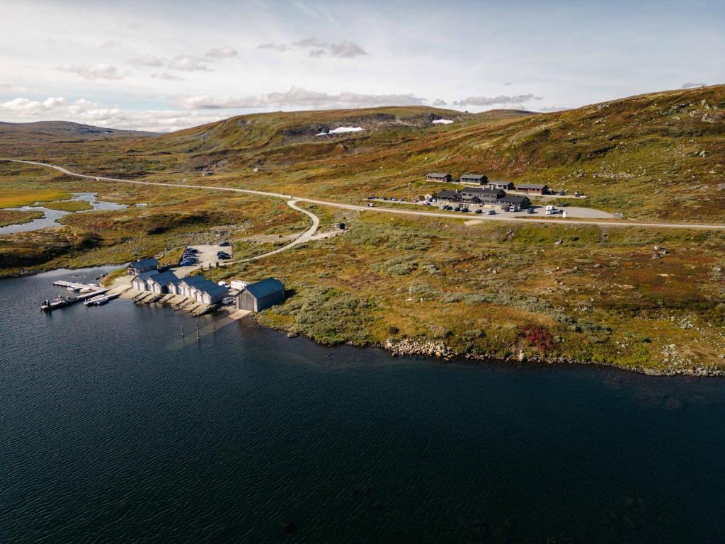 an aerial view of an island in a body of water at Halne Fjellstugu in Nygard