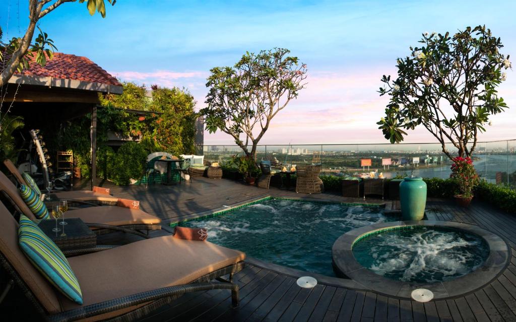 a hot tub on the deck of a hotel at Silverland Jolie Hotel in Ho Chi Minh City