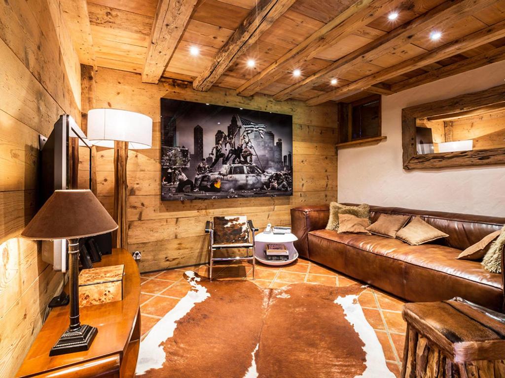 Μια τηλεόραση ή/και κέντρο ψυχαγωγίας στο Chalet 12 pers - Sauna - Terrasse - Wifi - FR-1-437-9