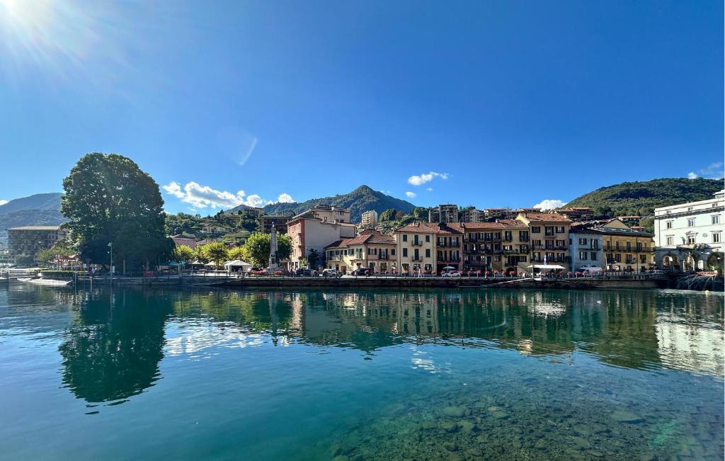 a large body of water with houses and buildings at 2 Bedroom Awesome Apartment In Omegna in Omegna