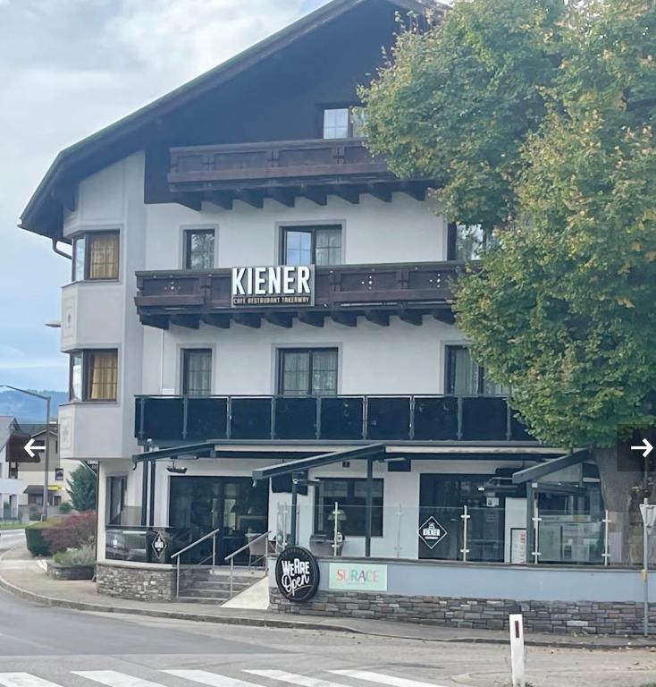 a hotel with a sign that saysken on it at Kiener by Blümel - Attergau in Sankt Georgen im Attergau