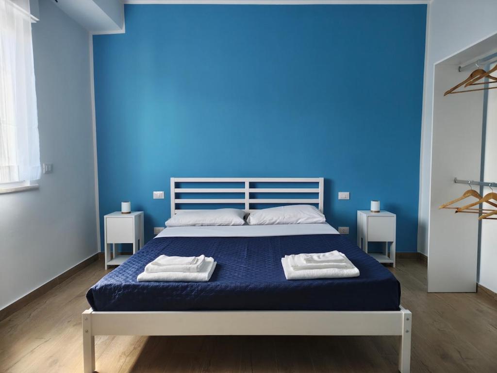 Postel nebo postele na pokoji v ubytování Sarina's apartment
