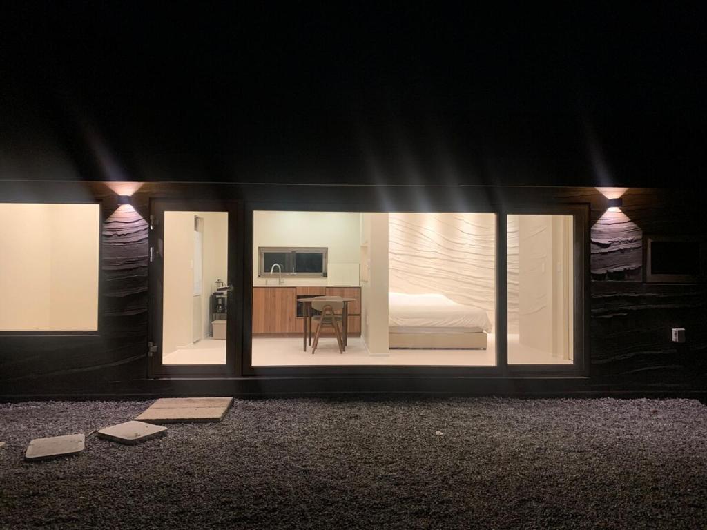 a room with a view of a bedroom with a bed at 양평스테이 Private Stay Near Seoul - Entire House Just for You 