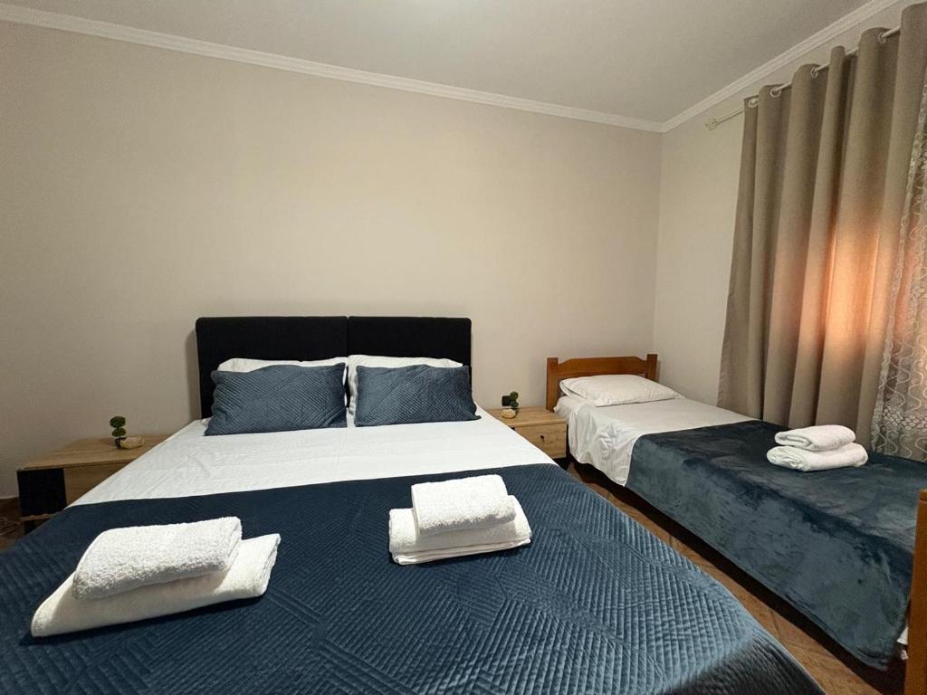 Ένα ή περισσότερα κρεβάτια σε δωμάτιο στο The Tirana Timehouse