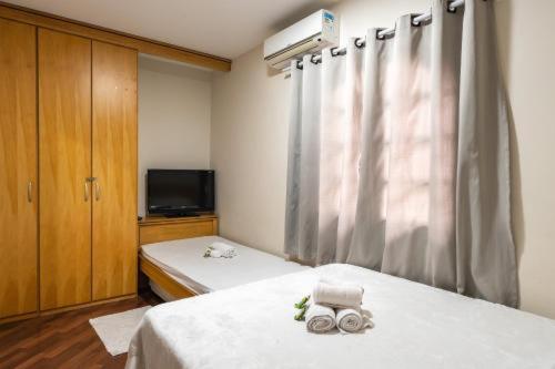 Televisyen dan/atau pusat hiburan di Sunny Hostel