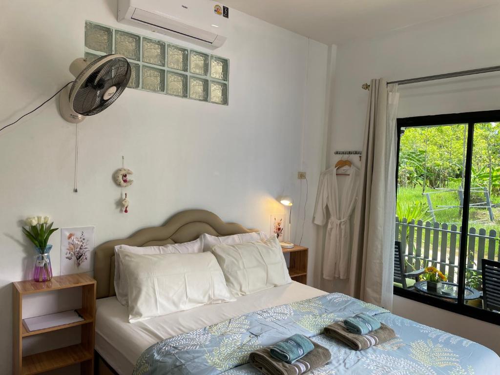 Ένα ή περισσότερα κρεβάτια σε δωμάτιο στο Alina cottage
