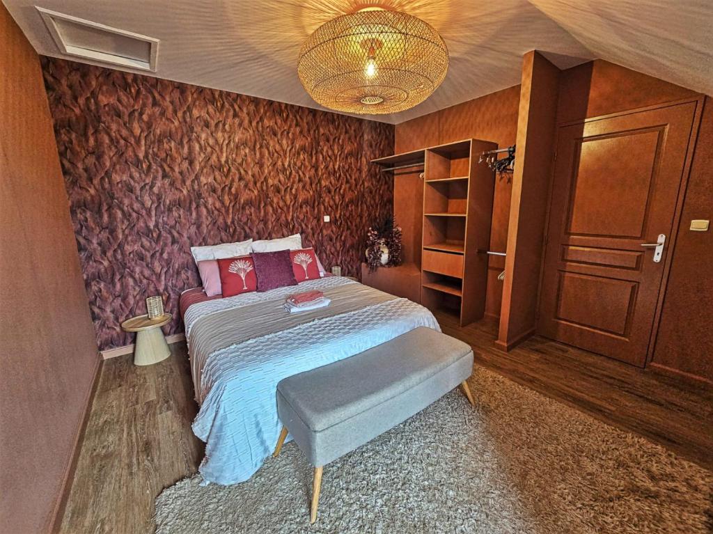 Postel nebo postele na pokoji v ubytování La Parenthèse exotique, duplex cosy à deux pas du lagon