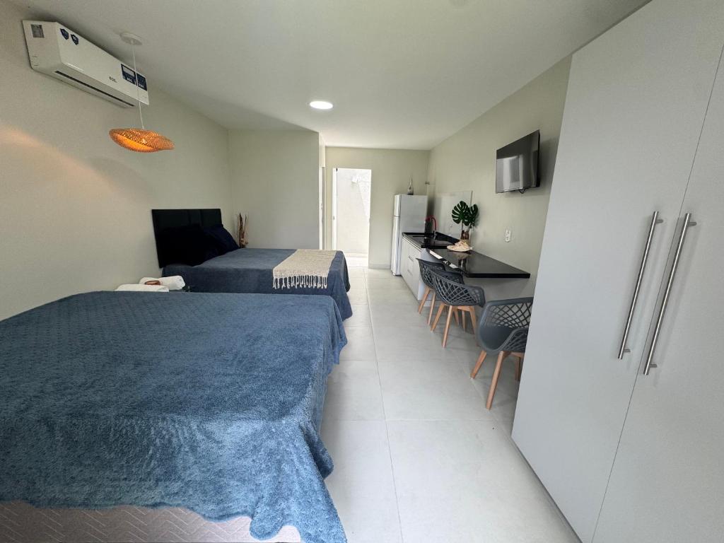 Μια τηλεόραση ή/και κέντρο ψυχαγωγίας στο Studio Top no Residencial Porto Mar