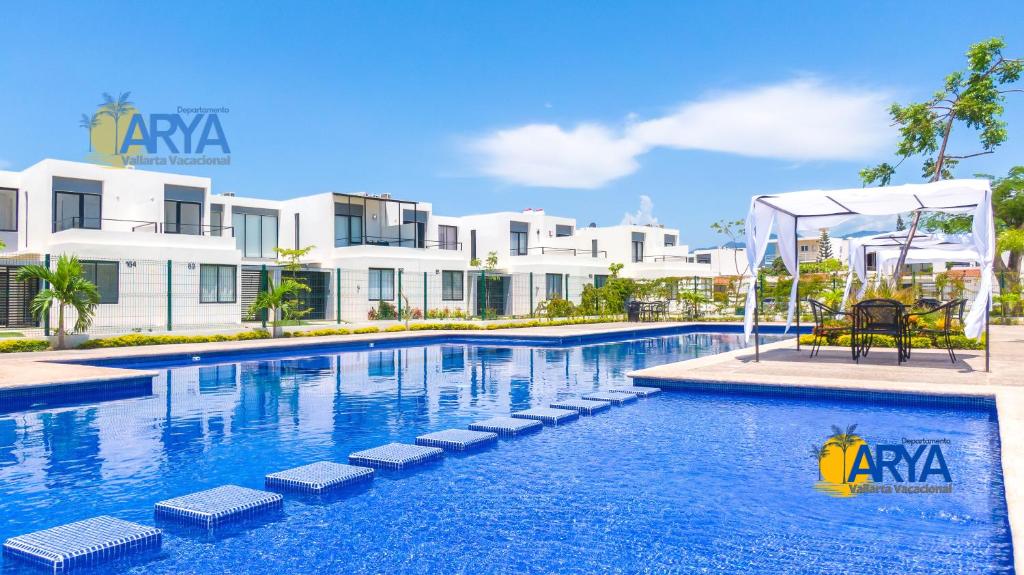 Πισίνα στο ή κοντά στο Casa en Coto con Alberca, cerca Aeropuerto, extenso jardin, nueva!