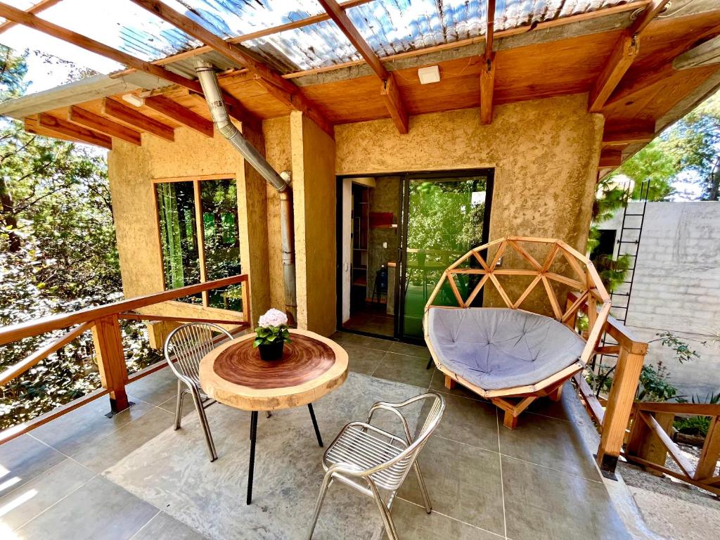 Un balcon sau o terasă la Cabaña Roble