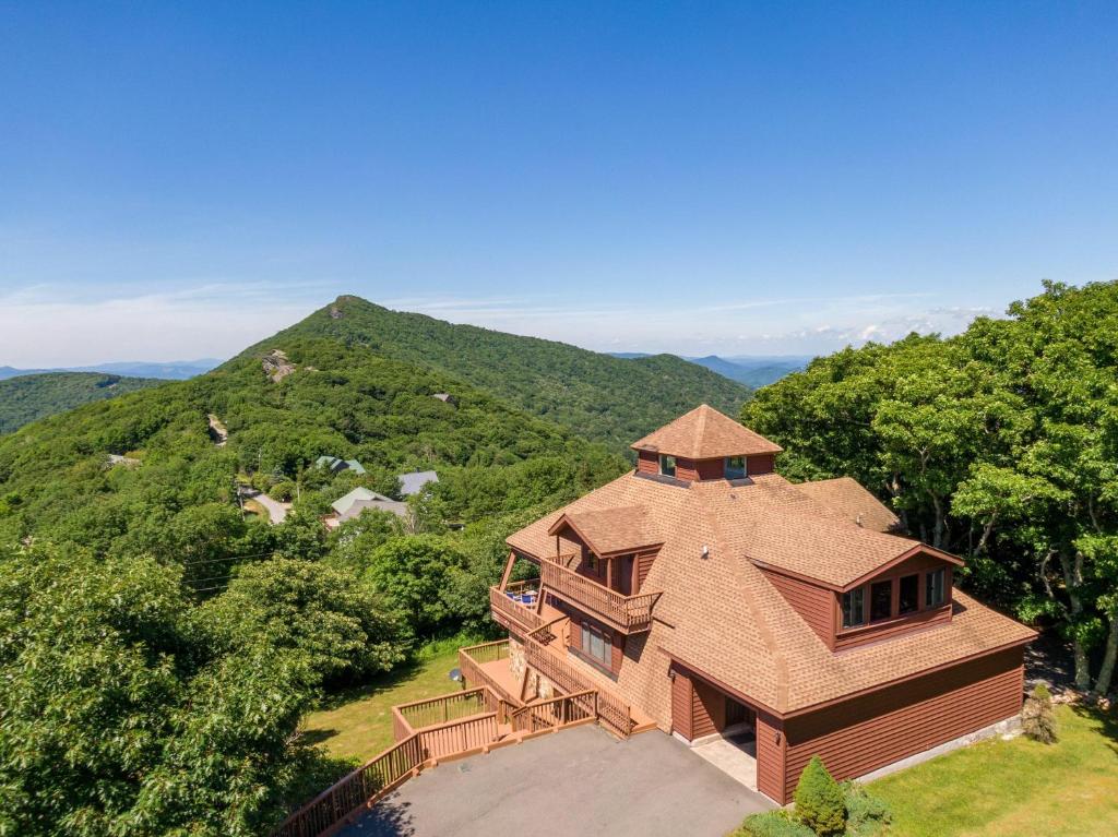 an aerial view of a house in the mountains at Endless Vistas in Seven Devils